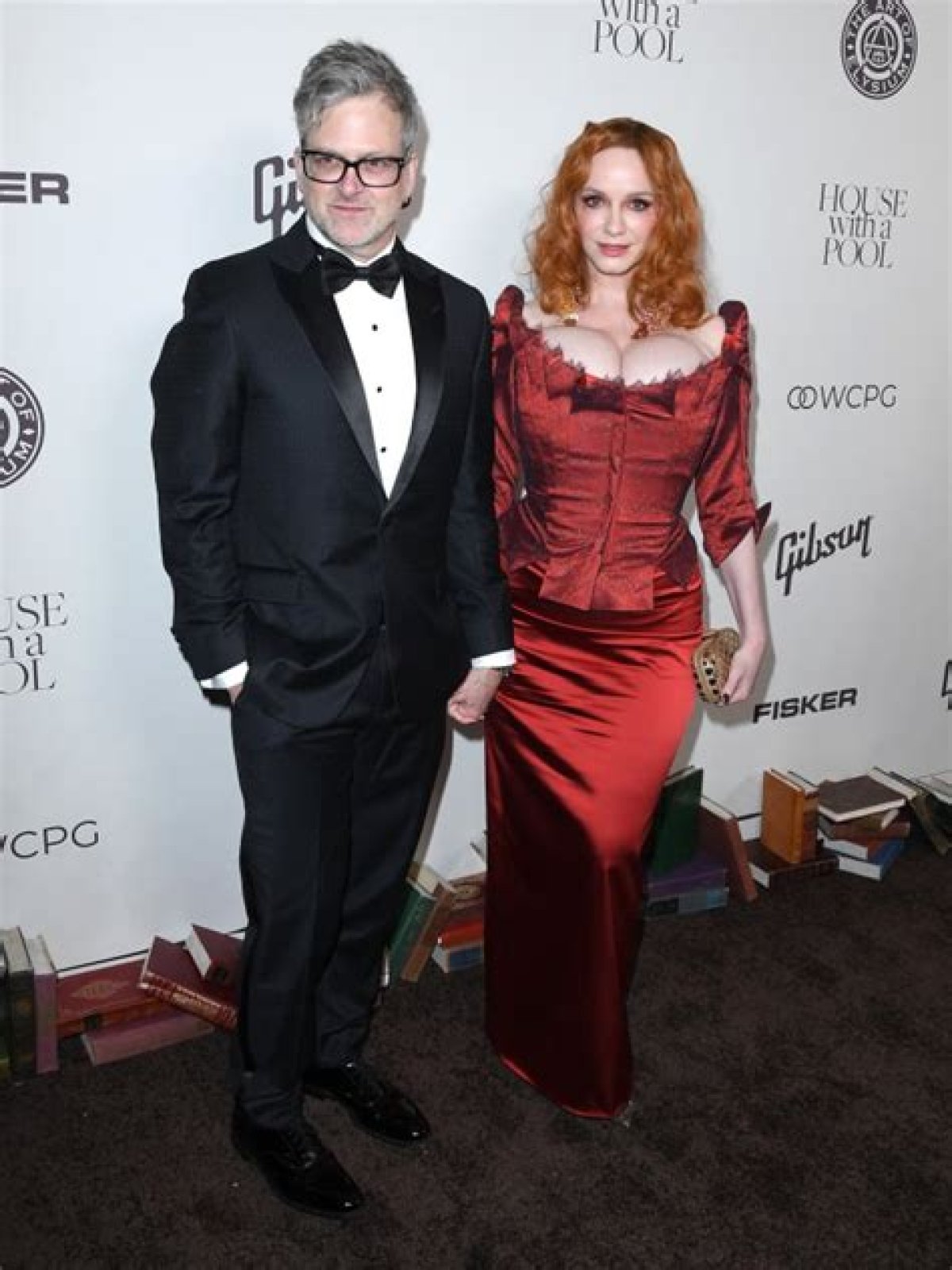 Christina Hendricks wore a corseted look & terrible makeup to the Art of Elysium gala